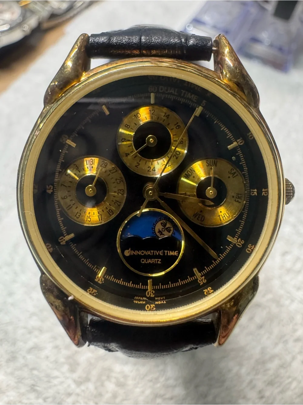 Quartz Men's Gold and Black Multi-Function Watch